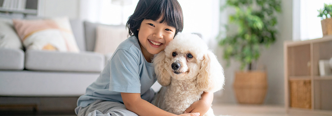 こどもと犬の画像