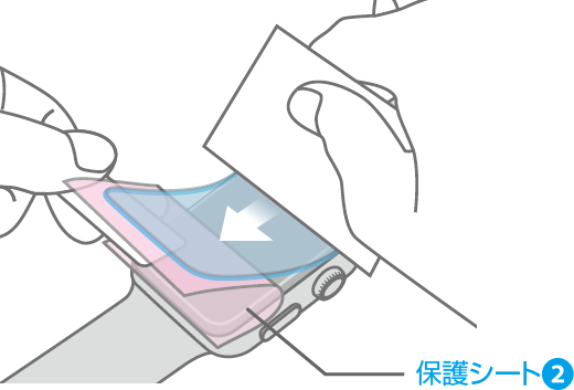 ヘラで空気を抜きながら保護シート2を貼り付けるイメージ画像